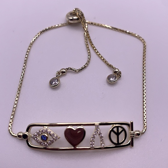 Gold Bracelet With Cartouche Bar Featuring Heart, Peace, Wishbone & Evil Eye - Picture 3 of 4